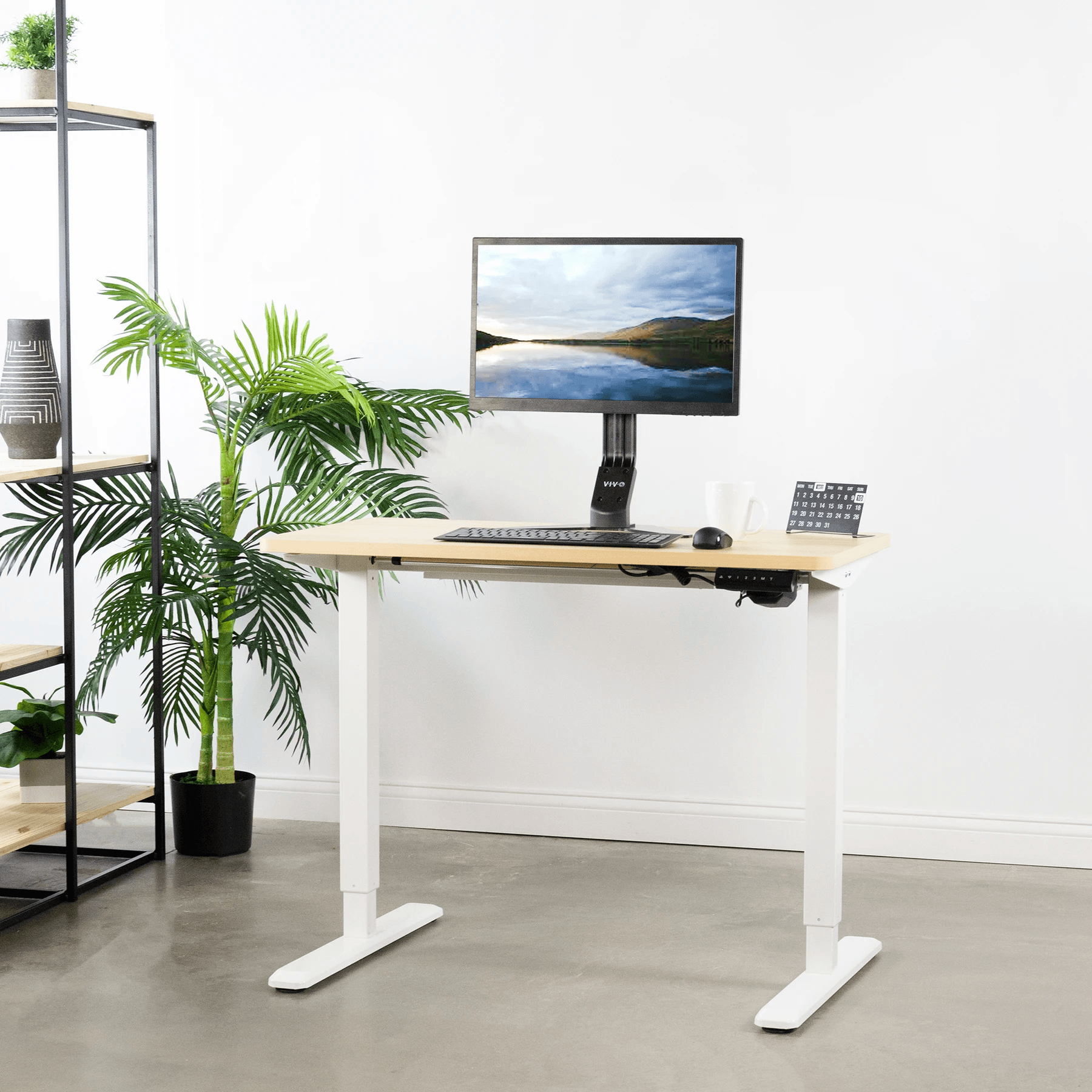 https://www.upmostoffice.com/cdn/shop/products/uplift-office-vivo-electric-43_-x-24_-stand-up-desk-desk-kit-1w4c-light-wood-table-top-white-frame-25221355.png?v=1601864325