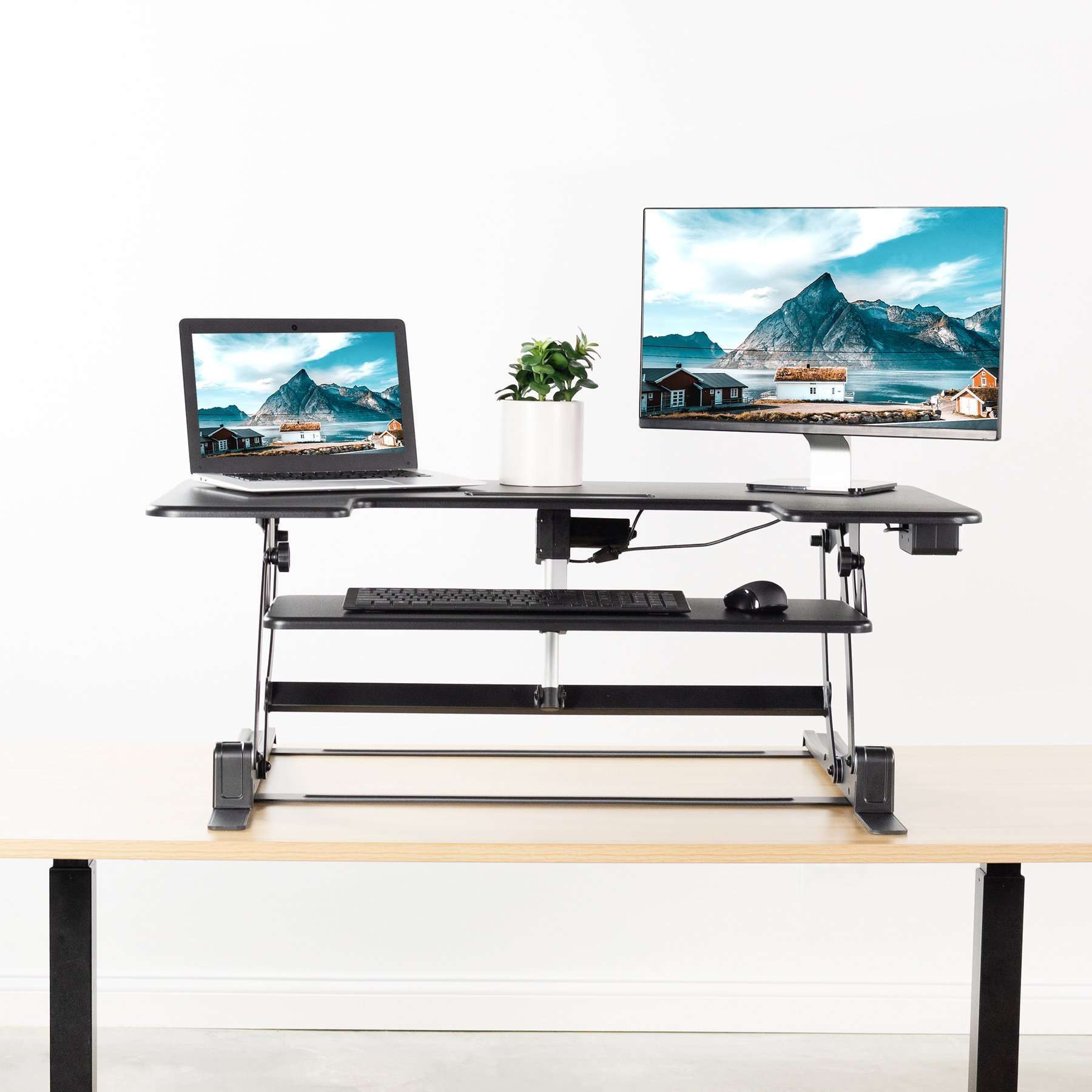https://www.upmostoffice.com/cdn/shop/products/vivo-black-electric-height-adjustable-extra-wide-42-stand-up-desk-desk-v000vle-converter-black-upliftofficecom-25353607@2x.jpg?v=1601864102